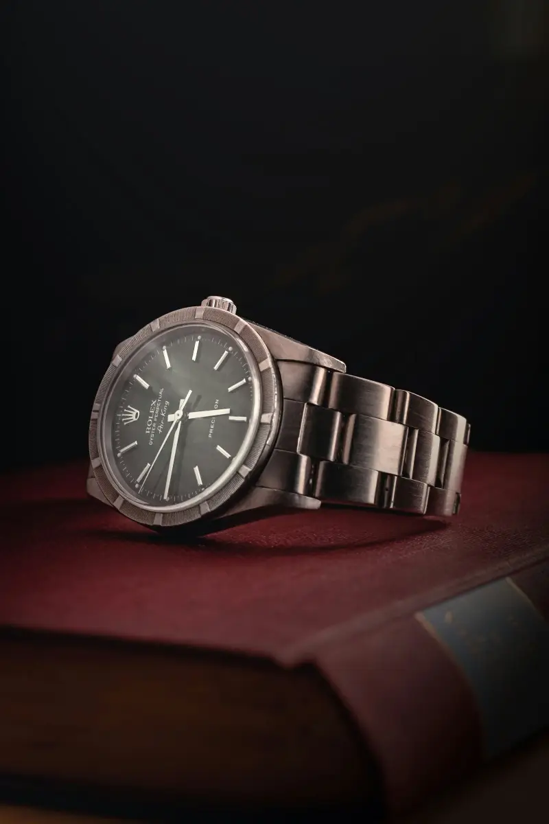 A luxury chronograph wristwatch with black sub-dials